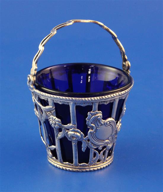 A George III pierced silver cream pail, 4.25in over handle.